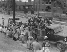 Cotton hoers loading at Memphis, Tennessee for the day's work in Arkansas, 1937. Creator: Dorothea Lange