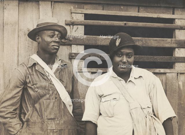 Cotton pickers receiving sixty cents a day, Pulaski County, Arkansas, October 1935. Creators: Farm Security Administration, Ben Shahn.