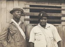 Cotton pickers receiving sixty cents a day, Pulaski County, Arkansas, October 1935. Creators: Farm Security Administration, Ben Shahn