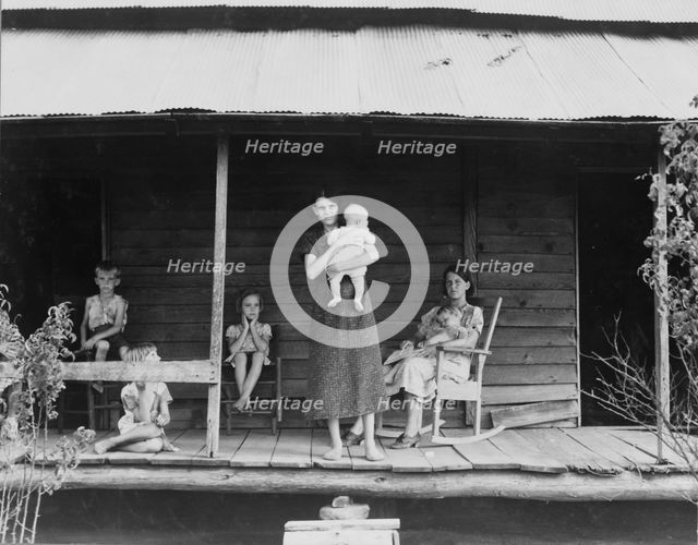 Cotton sharecropper family, Macon County, Georgia, 1937. Creator: Dorothea Lange.