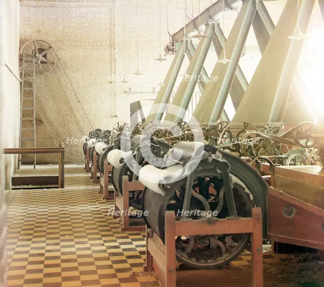 Cotton textile mill interior with machines producing cotton thread..., between 1905 and 1915. Creator: Sergey Mikhaylovich Prokudin-Gorsky.