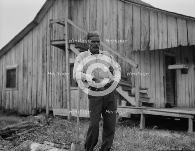 Cotton worker in Sunday clothes, near Blytheville, Arkansas, 1937. Creator: Dorothea Lange.