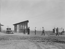 Cotton workers, outskirts of Firebaugh, west side of San Joaquin Valley, California, 1939. Creator: Dorothea Lange