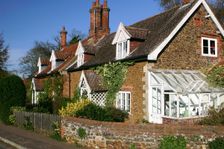 Cottages in the village of Castle Rising, King's Lynn, Norfolk, 2005. Creator: Peter Thompson