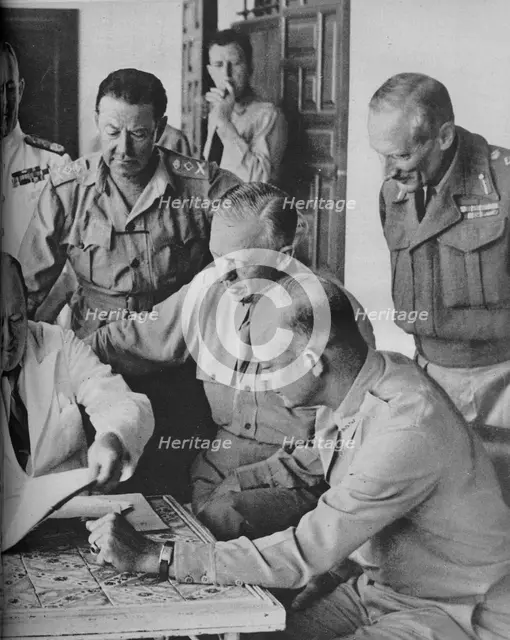 'Council of War in Algiers: Mr Churchill with his Captains', 1943. Artist: Unknown.