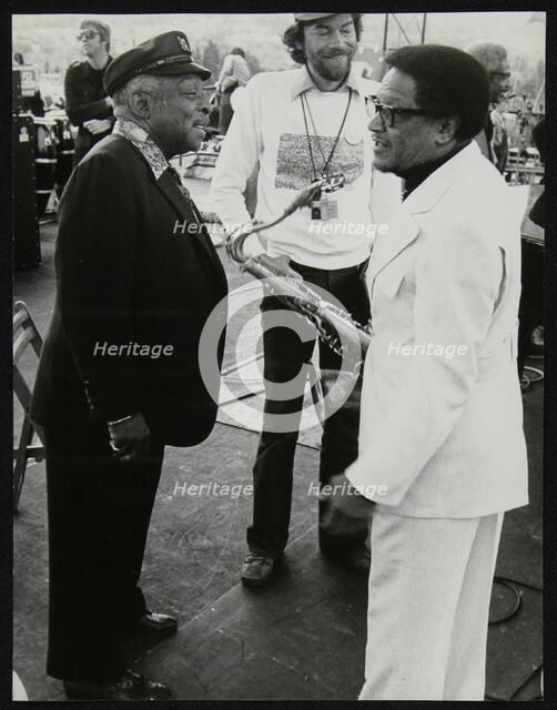 Count Basie chatting with Illinois Jacquet at the Capital Radio Jazz Festival, London, July 1979. Artist: Denis Williams