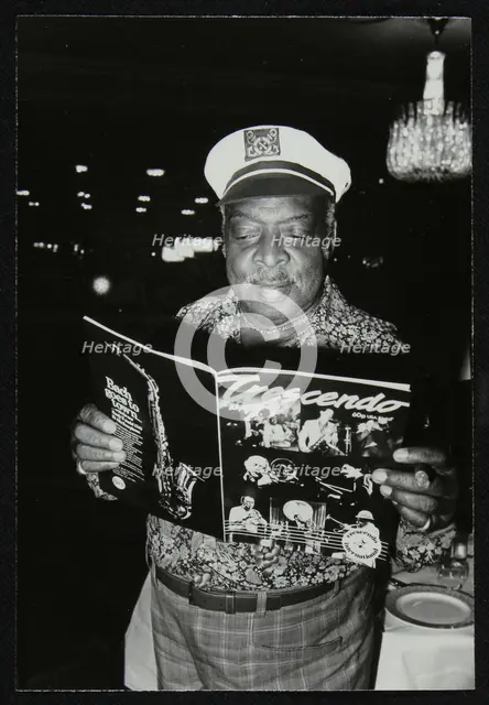 Count Basie reading a copy of Crescendo magazine at the Grosvenor House Hotel, London, 1979. Creator: Denis Williams.