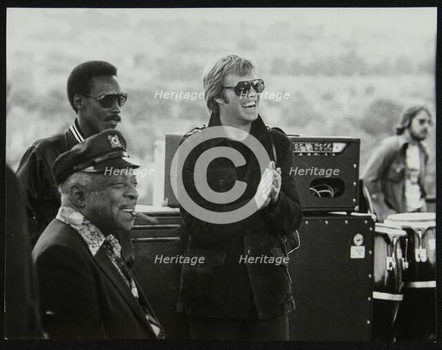 Count Basie with singer Dennis Rowland and drummer Butch Miles at the Capital Radio Jazz Festival, L Artist: Denis Williams