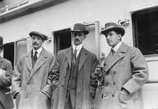 Count de Lesseps, G. Curtiss, and H. Latham standing on train platform, 1910. Creator: Bain News Service
