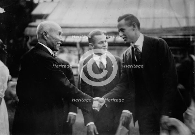 Count Okuma welcomes Paul Des Jardien of Chicago baseball team, 11/18/15, 1915. Creator: Bain News Service.