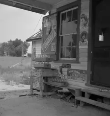 Country filling station owned and operated by tobacco farmer, Granville County, North Carolina, 1939 Creator: Dorothea Lange