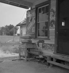 Country filling station owned and operated by tobacco farmer, Granville County, North Carolina, 1939 Creator: Dorothea Lange