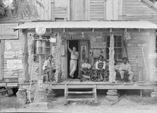 Country store on dirt road, Sunday afternoon, Gordonton, North Carolina, 1939. Creator: Dorothea Lange