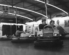 Couple on dodgems, c1960