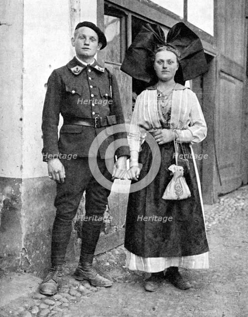 Couple in traditional dress, Alsace-Lorraine, Rhine, 1936.Artist: Donald McLeish