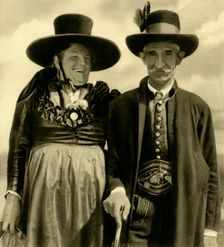 Couple in traditional dress, Sankt Lambrecht, Styria, Austria, c1935. Creator: Unknown