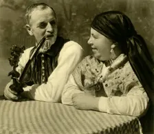 Couple in traditional dress, Upper Austria, c1935. Creator: Unknown