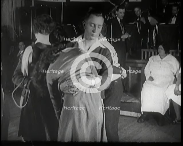 Couples Dancing Whilst Half Asleep in a Marathon Dance Contest, 1926. Creator: British Pathe Ltd.