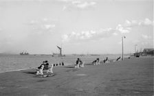 Couples sit on benches on the promenade at Gravesend, Kent, c1945-c1965. Artist: SW Rawlings