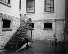 Court of tenement house, New York City, between 1900 and 1910. Creator: Unknown