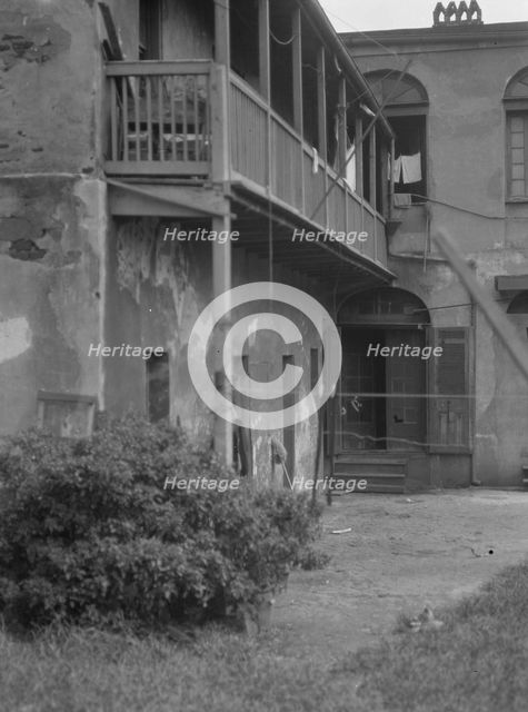 Courtyard, New Orleans, between 1920 and 1926. Creator: Arnold Genthe.