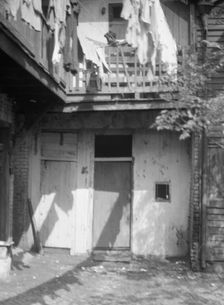 Courtyard, New Orleans, between 1920 and 1926. Creator: Arnold Genthe