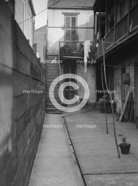 Courtyard, New Orleans, between 1920 and 1926. Creator: Arnold Genthe.