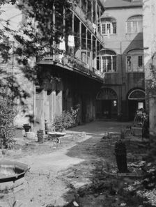 Courtyard, New Orleans, between 1920 and 1926. Creator: Arnold Genthe