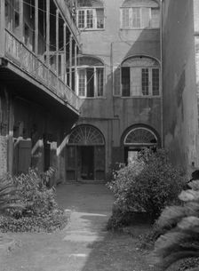 Courtyard, New Orleans, between 1920 and 1926. Creator: Arnold Genthe