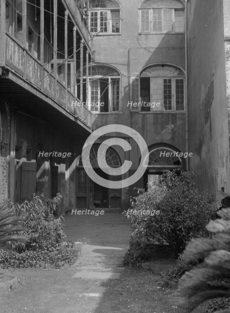 Courtyard, New Orleans, between 1920 and 1926. Creator: Arnold Genthe.