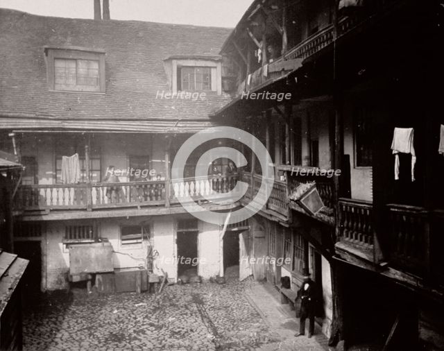 Courtyard at the Oxford Arms Inn, Warwick Lane, from the first floor, City of London, 1875. Artist: Society for Photographing the Relics of Old London