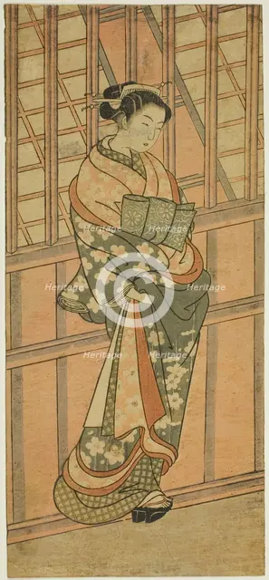 Courtesan Standing in Front of a Barred Window, c. 1765. Creator: Ishikawa Toyonobu.