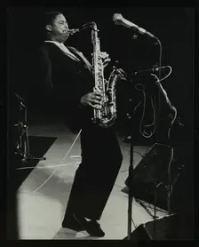 Courtney Pine on stage at the Forum Theatre, Hatfield, Hertfordshire, 8 April 1987. Creator: Denis Williams