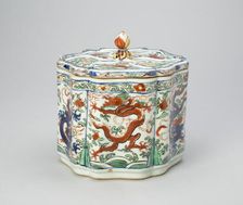 Covered Hexagonal Lobed Jar with Dragons Chasing a..., Ming dynasty, Wanli reign, (1573-1620). Creator: Unknown