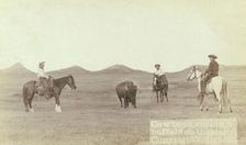 Cowboys, roping a buffalo on the plains, between 1887 and 1892. Creator: John C. H. Grabill