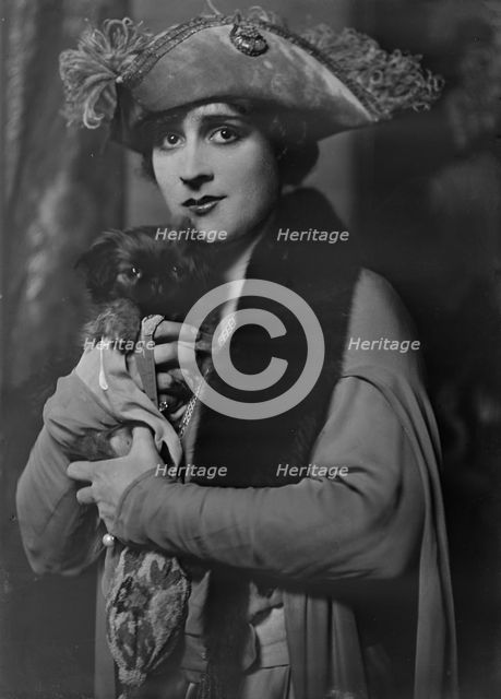 Cowl, Jane, Miss, with dog, portrait photograph, 1918 Oct. 14. Creator: Arnold Genthe.