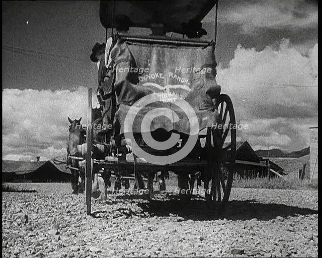 Coach and Horses Waiting To Pick up Passengers Arriving Off the Train, 1932. Creator: British Pathe Ltd.