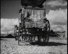 Coach and Horses Waiting To Pick up Passengers Arriving Off the Train, 1932. Creator: British Pathe Ltd