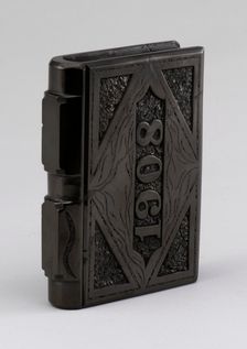Coal carved in shape of a book, 1900s. Creator: F Jukes