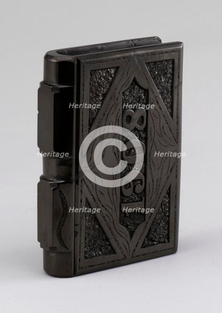 Coal carved in shape of a book, 1900s. Creator: F Jukes.