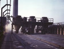 Coal feeders on tip of coke ovens...of the Great Lakes Steel Corporation, Detroit, Mich., 1942. Creator: Arthur S Siegel