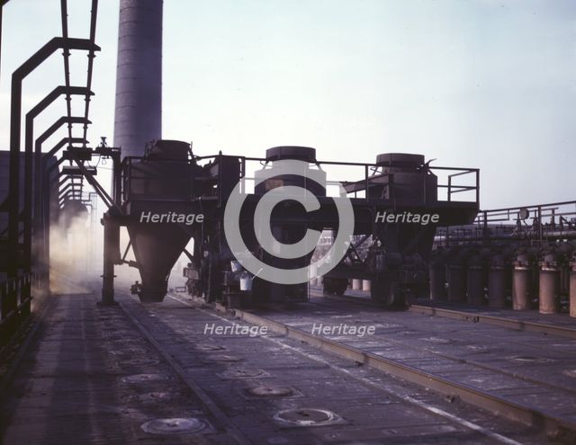 Coal feeders on tip of coke ovens...of the Great Lakes Steel Corporation, Detroit, Mich., 1942. Creator: Arthur S Siegel.