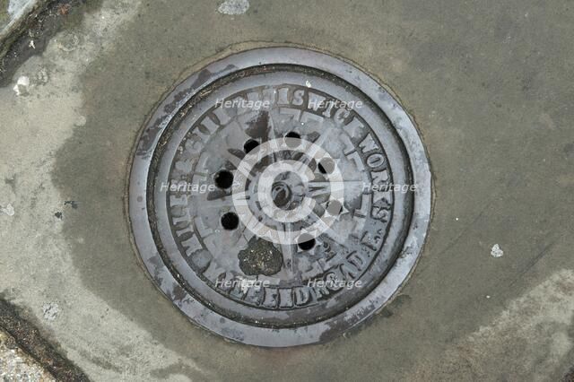 Coal hole plate outside 48 Arbour Square, Stepney, Tower Hamlets, London, 2010. Artist: Derek Kendall.