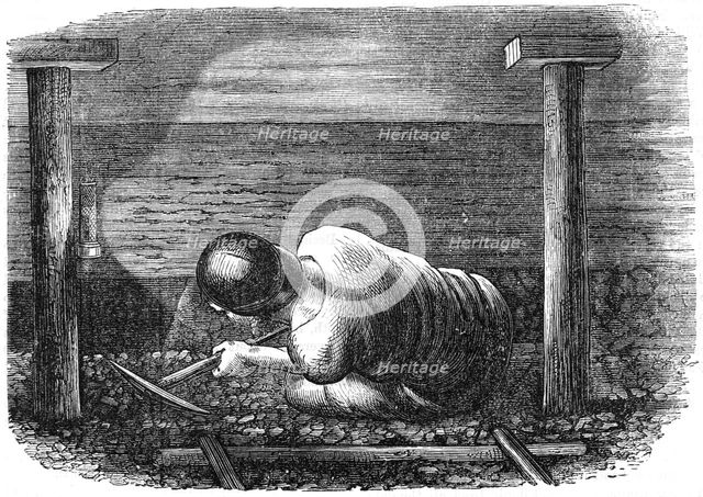 Coal miner working a narrow seam, c1864.  Creator: Anon.