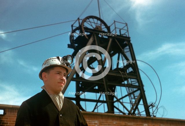 Coal miner at pit head.