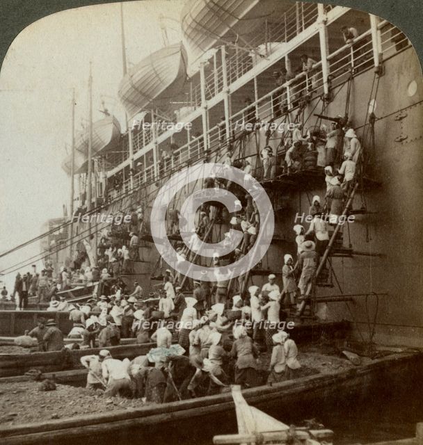 Coaling the Pacific mail SS 'Siberia', at the fortified naval station of Nagasaki, Japan, 1904. Artist: Underwood & Underwood