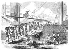 Coaling a Royal Mail steam-packet at Kingston, Jamaica, 1865. Creator: Unknown