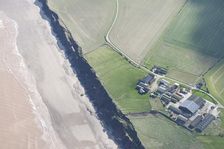 Coastal erosion at Low Farm, Aldbrough Sands, East Riding of Yorkshire, 2014. Creator: Historic England Staff Photographer