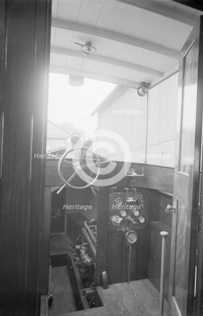Cockpit and hold on cabin cruiser D.G.S.P., 1913. Creator: Kirk & Sons of Cowes.