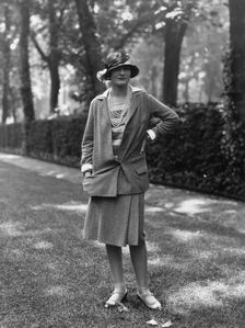 Coco Chanel modeling a Chanel suit on rue Faubourg Saint-Honoré in Paris, 1929, 1929. Creator: Sasha; (Alexander Stewart) (1892-1953)
